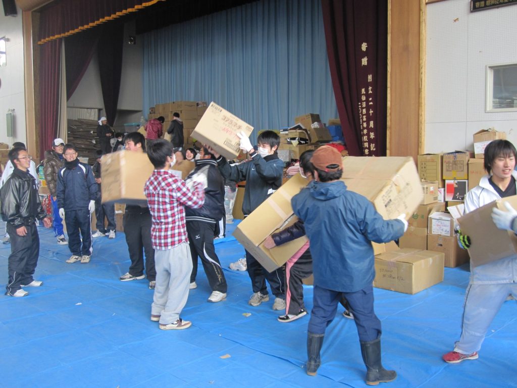 relief items transported and handled by students at evacuation center